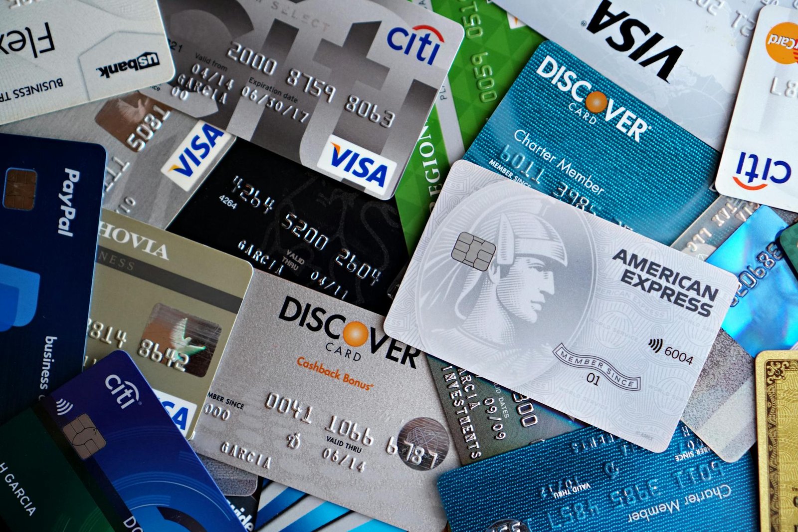 Home 5 A flat lay of assorted credit and debit cards from various banks. Ideal for finance and banking concepts.