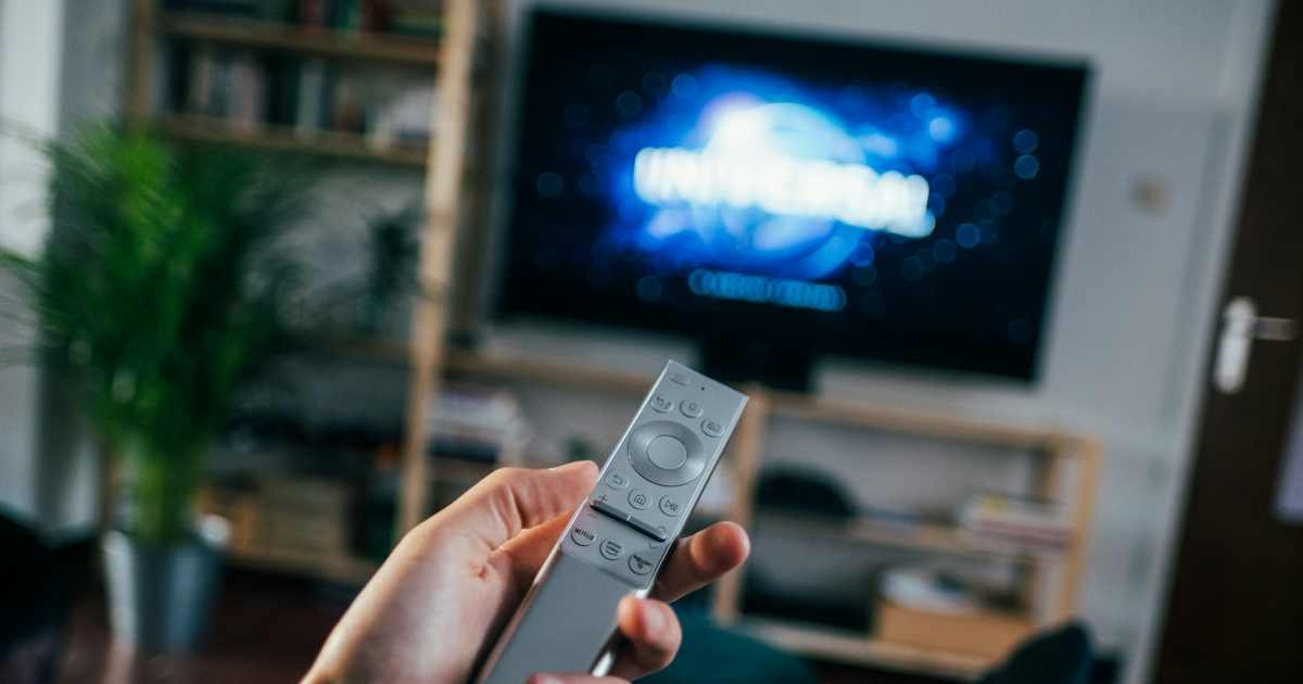 Television in a living room while reviewing streaming subscription charges